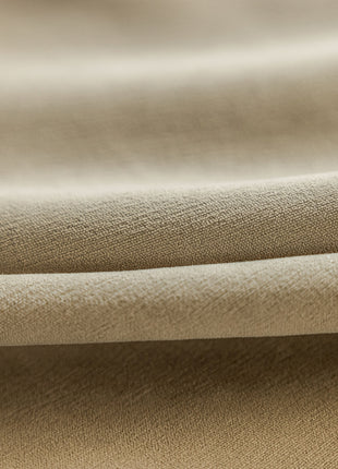 a close up view of a tan fabric