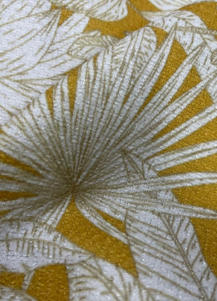a close up of a yellow and white wallpaper