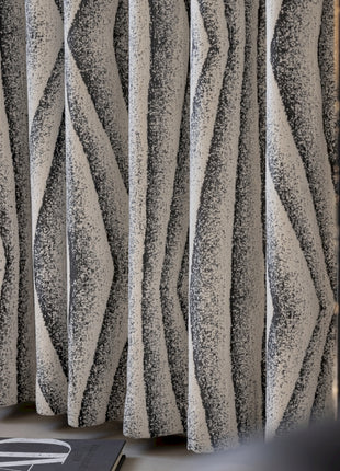 a black and white photo of a curtain