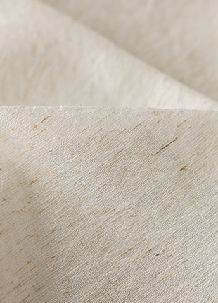 a close up view of a white fabric