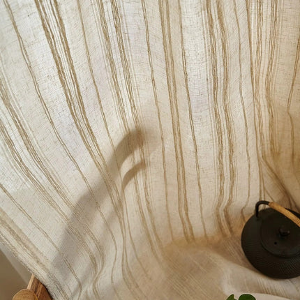 a potted plant sitting on top of a wooden table