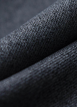 a close up view of a black fabric