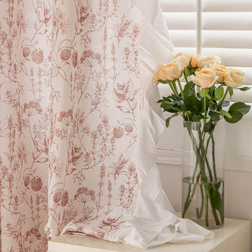 a vase filled with yellow roses next to a window