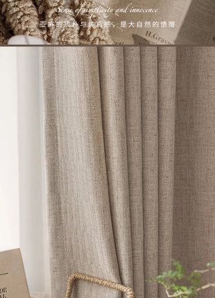 a basket sitting on top of a table next to a window