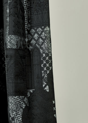 a black and white photo of a curtain