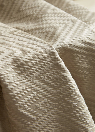 a close up of a textured white cloth