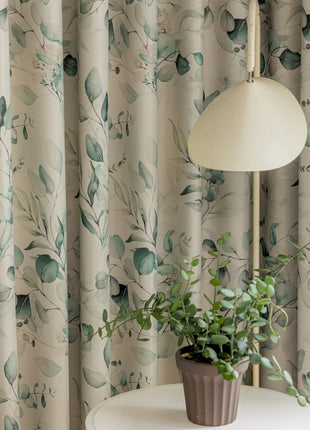 a white table with a potted plant on top of it