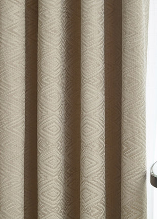 a close up of a window with a curtain