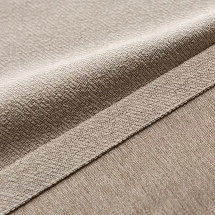 a close up view of a beige fabric