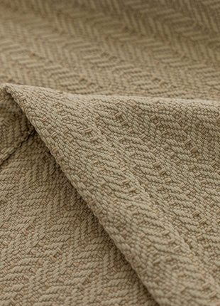 a close up of a tan colored fabric