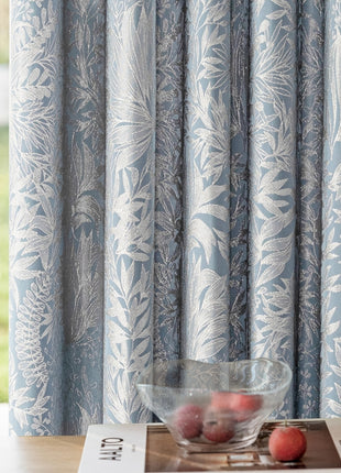 a bowl of fruit sitting on top of a table