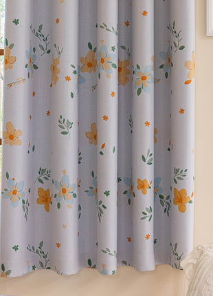 a bed sitting under a window next to a window