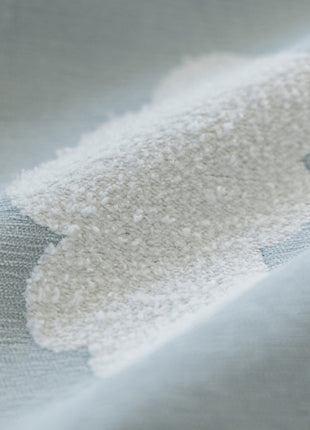 a close up of a white substance on a blue cloth