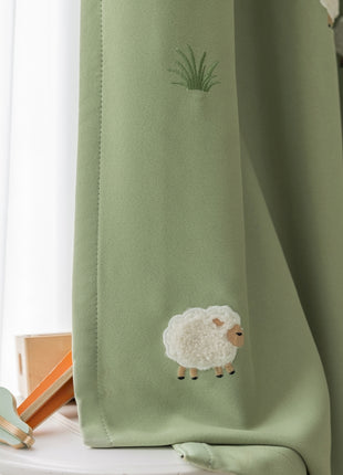 a curtain with a picture of a sheep on it