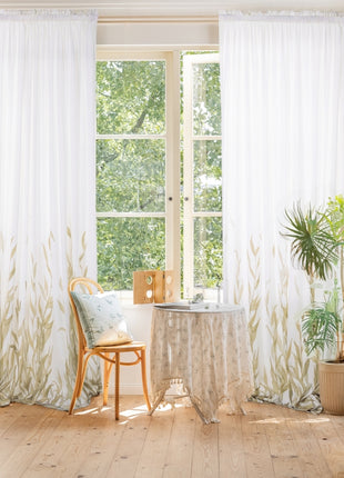 a room with a table, chair, and window