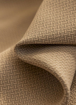 a close up view of a tan fabric