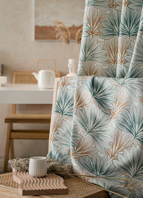 a living room with a chair and a table