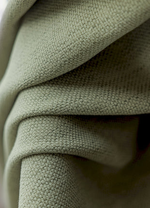 a close up view of a green cloth