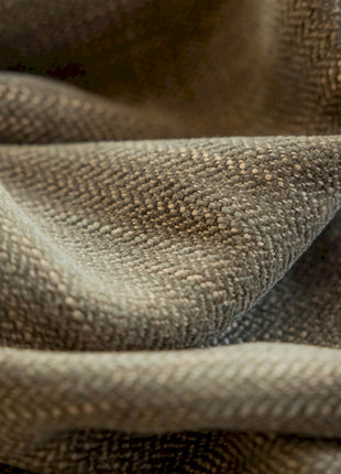 a close up of a fabric with a brown pattern