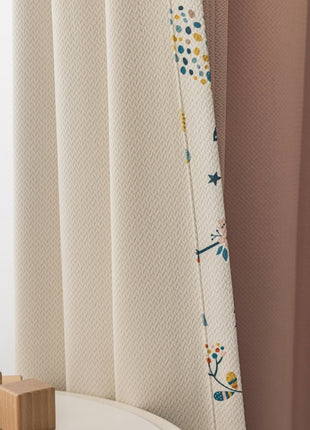 a bathroom with a toilet and a shower curtain