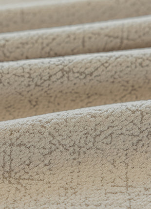 a close up of a curtain with a pattern on it