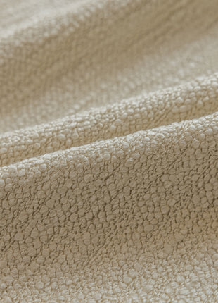 a close up view of a beige fabric