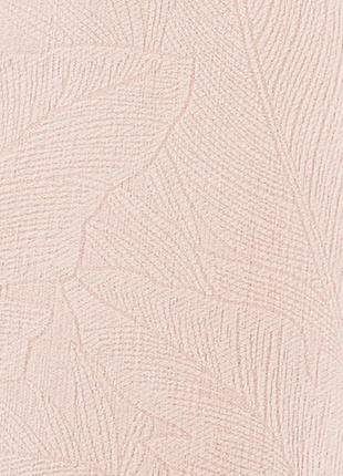 a close-up view of a textured fabric with a leaf-like pattern, showcasing the intricate details and textures of the material.