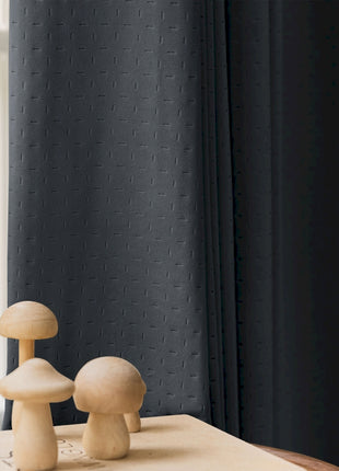 a couple of mushrooms sitting on top of a table