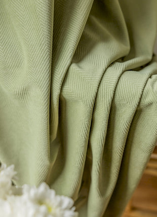 a close up of a chair with a flower on it