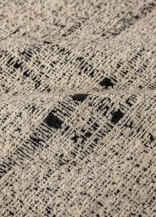 a close up of a black and white blanket