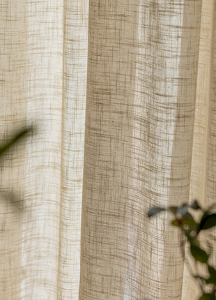 a close up of a window with a bird flying by