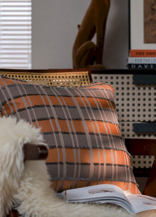 a dog is sitting on a chair with a book