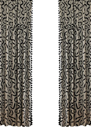 a pair of curtains with a black and white pattern