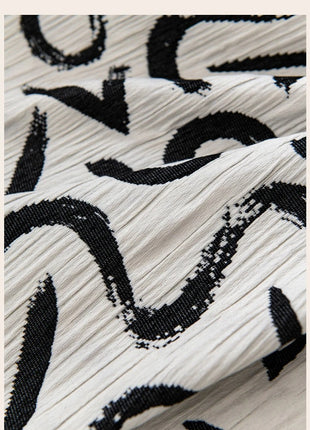 a close up of a black and white fabric