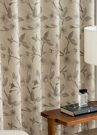 a table with a lamp and a book on it