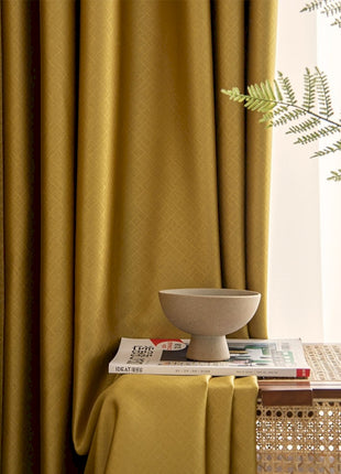 a bowl on a table next to a window