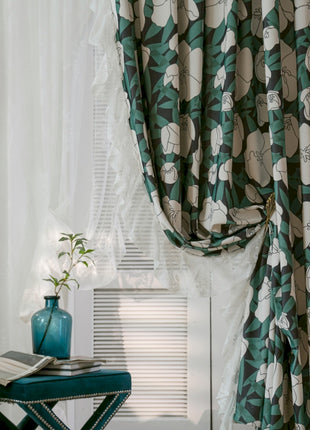 a chair and a table in front of a window