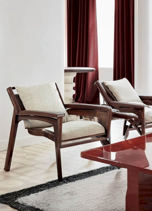 a living room with two chairs and a coffee table