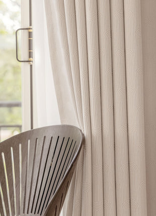 a wooden chair sitting next to a window
