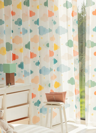 a child's bedroom with a colorful wallpaper