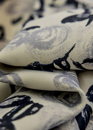 a close up of a black and white pattern on fabric