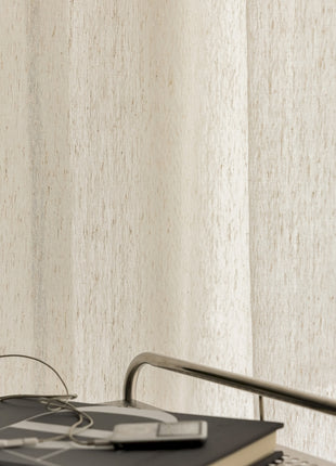 a pair of glasses sitting on top of a book