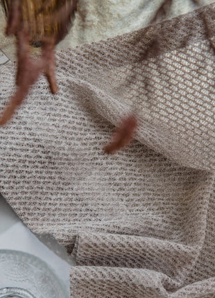 a close up of a towel and a sink