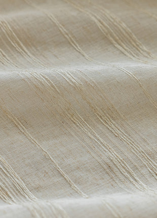 a close up view of a beige fabric