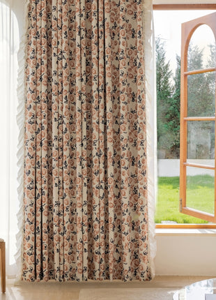 a living room with a chair and a window