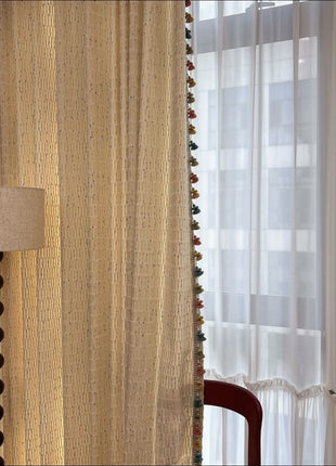 Bohemian blackout curtain with fringed tile pattern