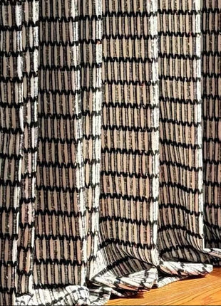 Bohemian blackout curtain with fringed tile pattern