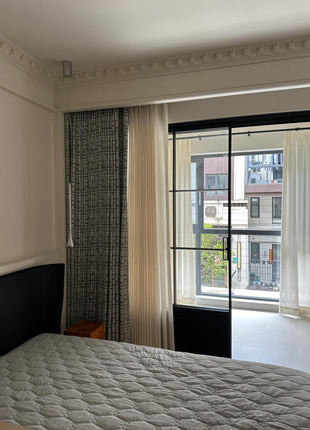 Black blackout curtain with silver patterns in modern baroque style