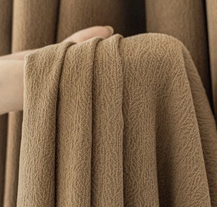 Blackout curtains in chevron textured fabric living room