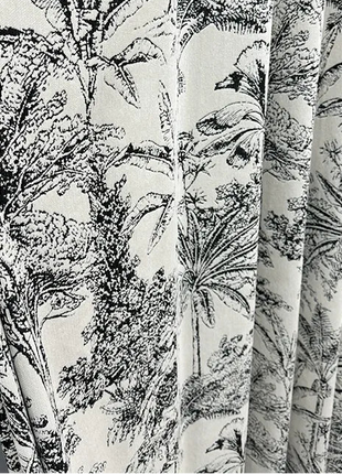 Wool curtain with black and white floral pattern